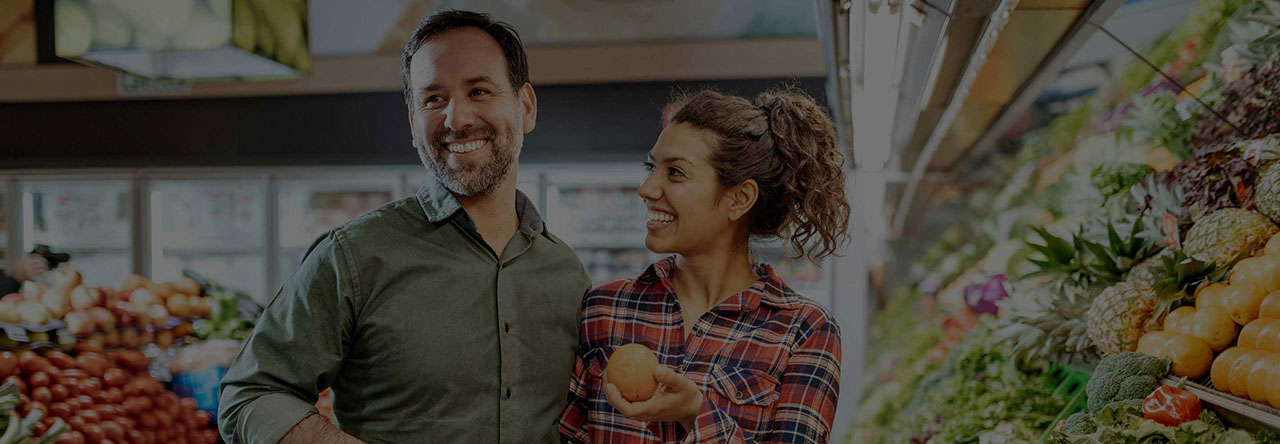 couple shopping at grocery store