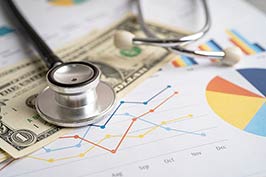 a stethoscope on a dollar bill