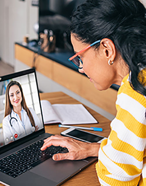 woman-using-Telemedicine-on-laptop