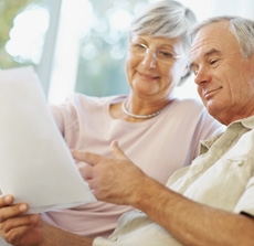 Happy senior couple planning for retirement